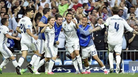 Ronaldo hat-trick fires Real into semis
