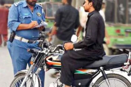 : "Lahore Traffic Police", "Helmet Law Enforcement",