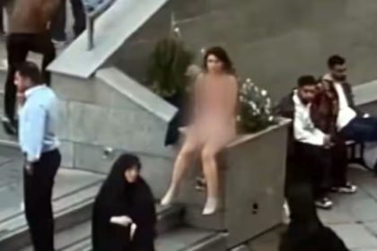 Iranian Woman Strips off in University