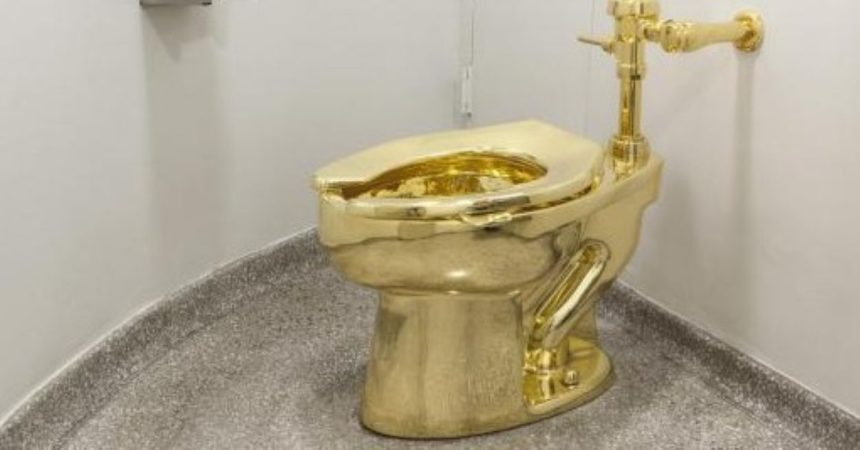solid gold toilet auction