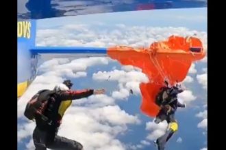 skydiver parachute snags plane video