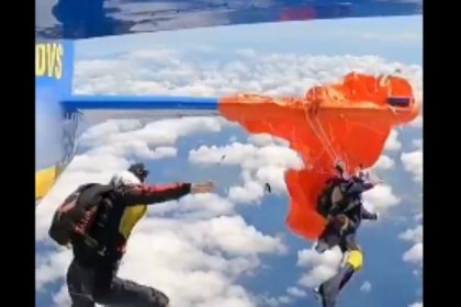 skydiver parachute snags plane video