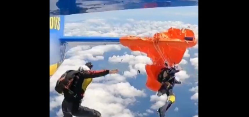 skydiver parachute snags plane video