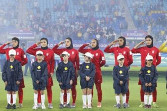 Iranian players salute national anthem vs. Philippines, Women's Asian Cup, Gold Coast Stadium, March 8, 2026