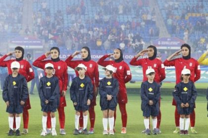 Iranian players salute national anthem vs. Philippines, Women's Asian Cup, Gold Coast Stadium, March 8, 2026