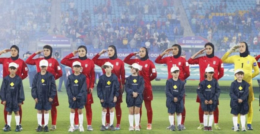 Iranian players salute national anthem vs. Philippines, Women's Asian Cup, Gold Coast Stadium, March 8, 2026