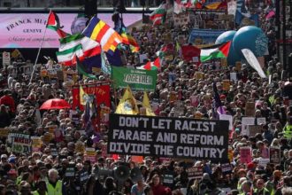 Demonstrators march against far-right extremism from Park Lane to Trafalgar Square in London, March 28, 2026.