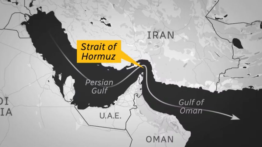 A map shows the Strait of Hormuz between Iran, Oman and the UAE, linking the Persian Gulf with the Gulf of Oman.