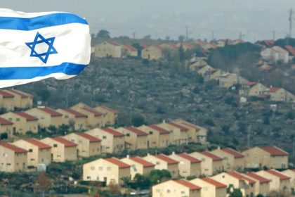 ALT Text: Israeli flag displayed near the West Bank settlement of Ofra.