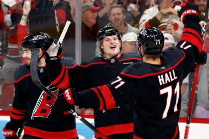 Carolina Hurricanes players celebrate during Game 5 against the Montreal Canadiens.