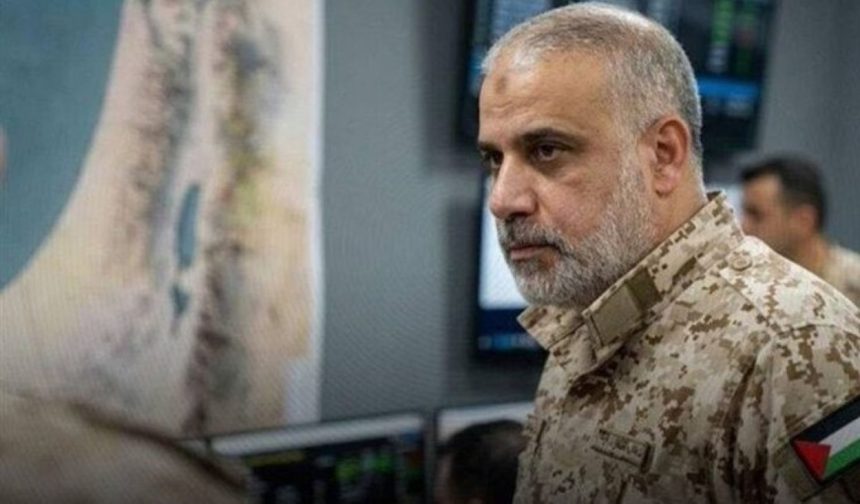 Hamas Commander Mohammed Odeh is shown in military-style clothing inside an operations room.