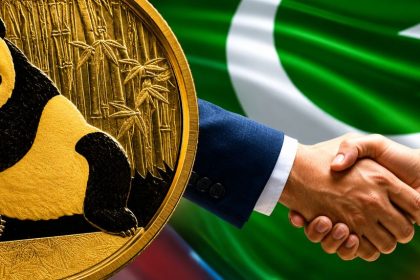 A gold coin featuring a panda appears beside two people shaking hands, with the Pakistani flag in the background, symbolizing Pakistan’s Panda Bonds or China-linked financing.