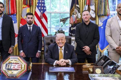 President Donald Trump sits at the Oval Office desk with UFC Freedom 250 fighters Ilia Topuria, Alex Pereira, Justin Gaethje and Ciryl Gane standing nearby.