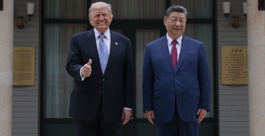 President Donald Trump and President Xi Jinping stand side by side for photos at Zhongnanhai Garden in Beijing during the final day of their summit.