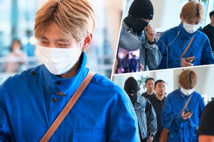 BTS members V and Jungkook move through Incheon International Airport, where V shared headphones with Jungkook before a flight to Madrid.