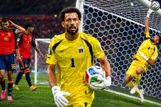 Cape Verde goalkeeper Vozinha makes a save against Spain during a 0-0 World Cup draw.
