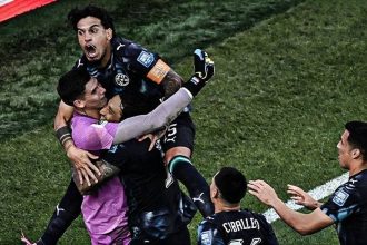 Paraguay players celebrate after defeating Germany on penalties in the FIFA World Cup 2026 Round of 32 in Foxborough.
