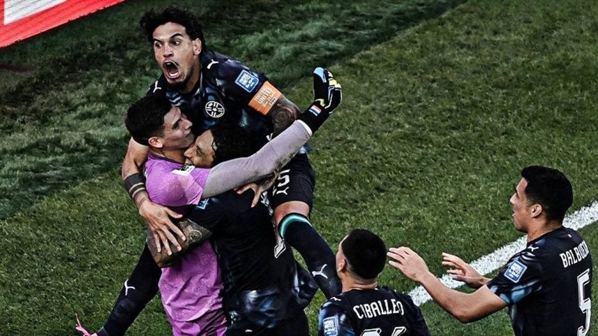 Paraguay players celebrate after defeating Germany on penalties in the FIFA World Cup 2026 Round of 32 in Foxborough.