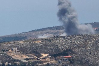 Smoke rises from a hillside near Aarab Salim after an Israeli strike in southern Lebanon.
