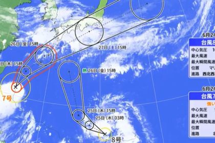 Weather map showing two tropical cyclones moving toward Japan amid typhoon warnings.