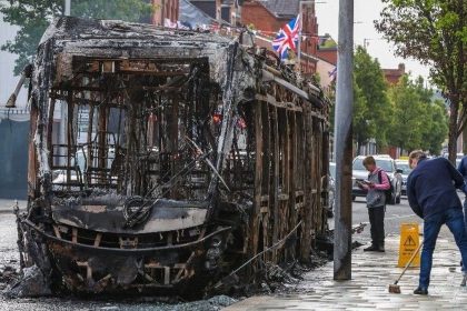 Northern Ireland violence shows fires and police lines in Belfast after the Stephen Ogilvie knife attack