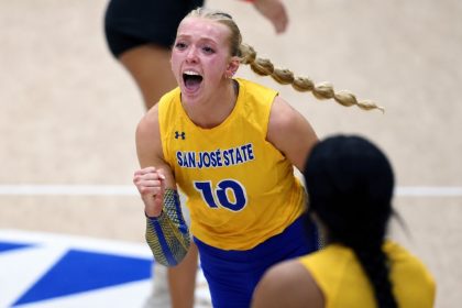 Brooke Slusser celebrates during a San Jose State University volleyball match.