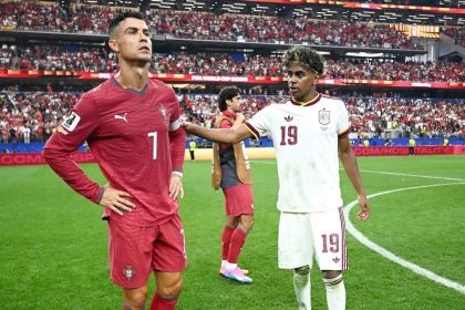 Lamine Yamal commiserates with Cristiano Ronaldo after Spain beat Portugal in World Cup Round of 16.