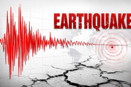 Earthquake alert graphic shows seismic waves and cracked ground.