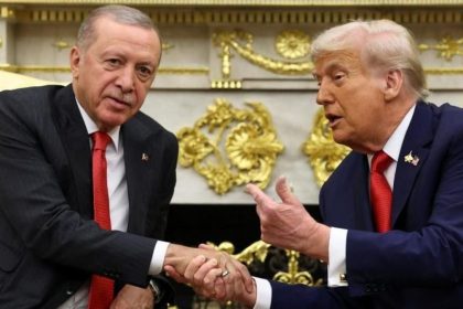 President Recep Tayyip Erdogan and US President Donald Trump shake hands at the White House.