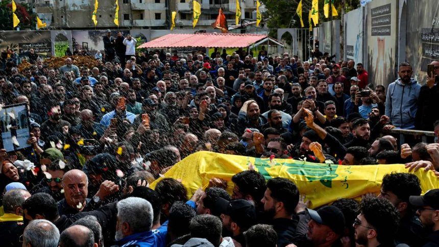 Hezbollah mass funeral for 44 people in southern Lebanon on July 18