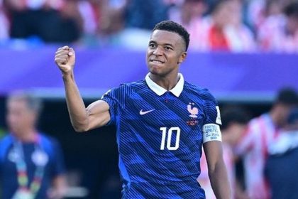 France eliminate Paraguay with Kylian Mbappe late penalty to reach World Cup quarterfinals.