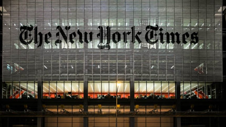 The New York Times headquarters building at night in New York City.