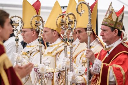 New Society of St Pius X bishops standing beside Bishop Alfonso de Galarreta during a consecration ceremony.