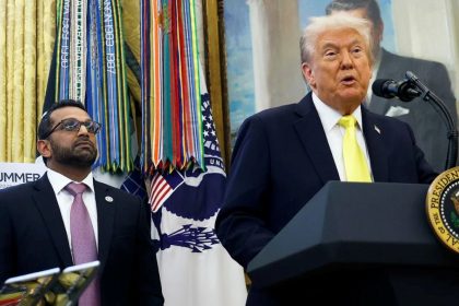 President Donald Trump and FBI Director Kash Patel announcing new crime data at a news conference.