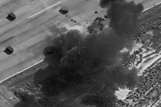 Smoke rises after US strikes hit 90 targets in Iran