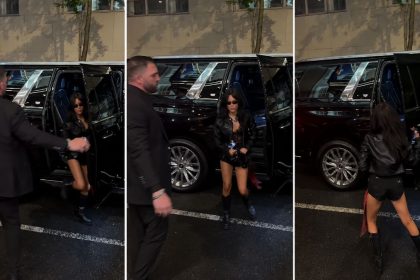 Jenna Ortega closes an SUV door as photographers wait nearby.