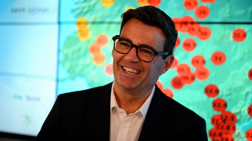 UK PM Andy Burnham smiling at an event.