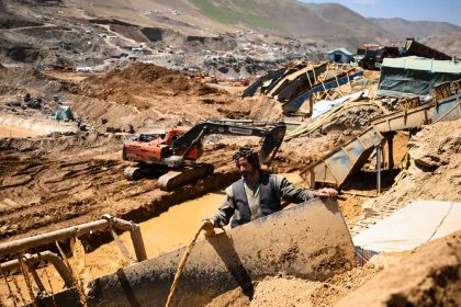 Afghan miner separating gold from dirt and stones in Badakhshan