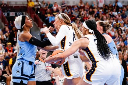 DiJonai Carrington and Sophie Cunningham clash during a WNBA game.