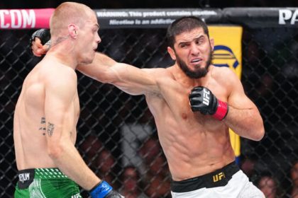 Islam Makhachev punches Ian Machado Garry at UFC 330