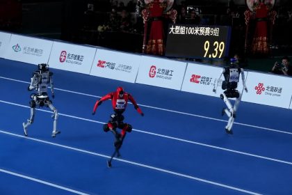 Lightning humanoid robot running 100-meter sprint during World Humanoid Robot Games preparations