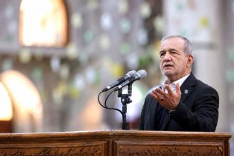 Iranian President Masoud Pezeshkian speaks at the tomb of Ayatollah Ruhollah Khomeini in Tehran during a cabinet visit on January 31, 2026. Image Credit: AFP File Photo