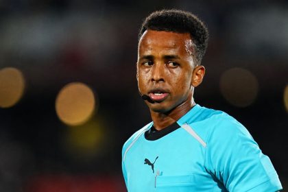 Omar Artan FIFA referee during a football match