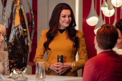 Rebecca Romijn in a Star Trek-inspired uniform at a gathering