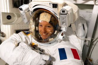 French astronaut Sophie Adenot wearing a spacesuit