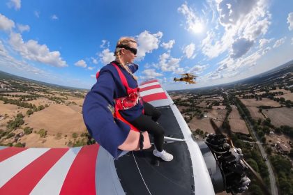 Sydney Sweeney wing walking during a flight