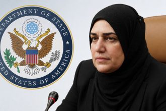 Former Iraqi Finance Minister Taif Sami Mohammed with the FBI emblem.