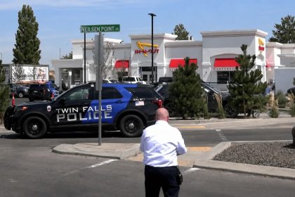 Twin Falls police vehicles outside an In-N-Out restaurant after a shooting on Aug. 1, 2026, in Twin Falls, Idaho.