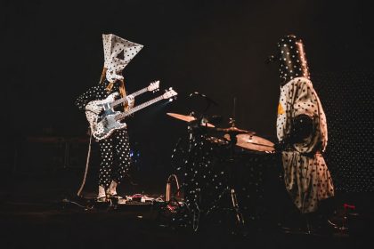 Angine de Poitrine, the Canadian experimental rock duo, performs on stage in its signature polka-dot costumes.