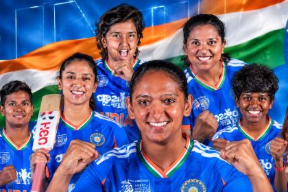 India women’s cricket team players posing together in blue jerseys